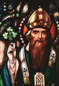 SAINT PATRICK -- St. Patrick, bishop and missionary to Ireland, is depicted in this stained-glass window at the Crosier Community in Anoka, Minn. Legend says that he used the shamrock to describe the Trinity to those he sought to convert. His feast day is March 17. (CNS photo from Crosiers Photography) ( Feb. 11, 1998)