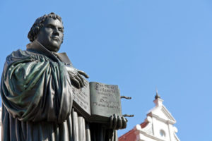 Monument of Martin Luther. It was the first public monument of the great reformer, designed 1821 by Johann Gottfried Schadow. Martin Luther (1483 Ð 1546) was a German monk, theologian, and church reformer. He is also considered to be the founder of Protestantism. He lived and worked many years in Wittenberg. This is monument from the 19th century on the market place in Wittenberg.
